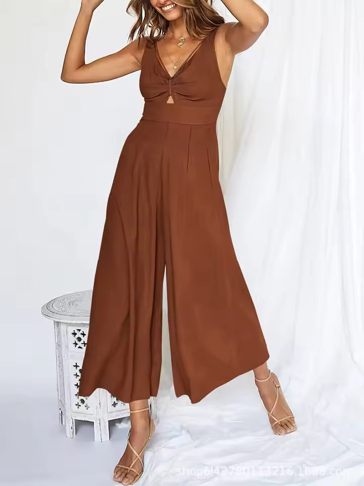 Women's V-neck strapless jumpsuit with openwork pleated design, high waist and wide legs for a taller look
